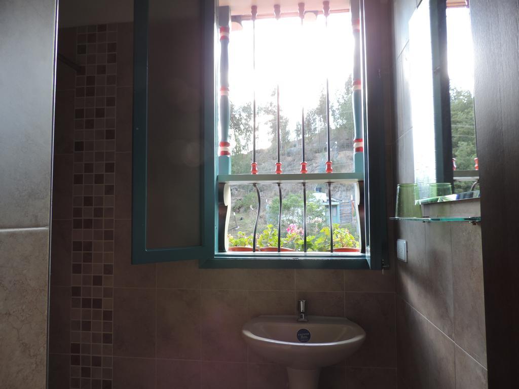 Hotel Los Geranios Duitama Kamer foto